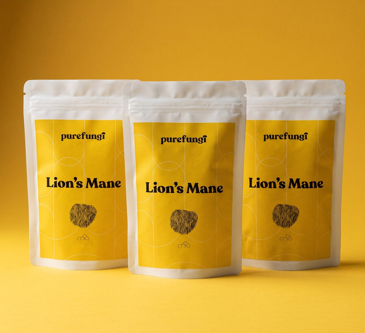 Pure Fungi Lion's Mane Capsules Triple Pack: three Lion's Mane capsule pouches on a yellow backdrop
